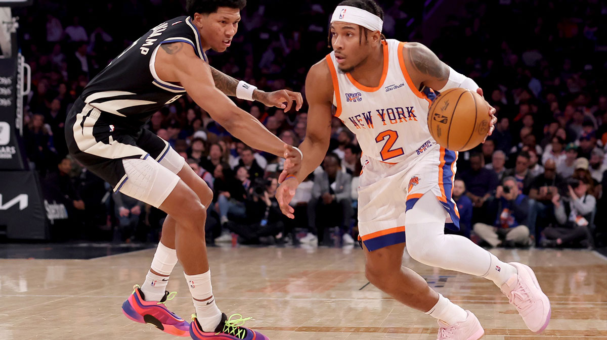 New York Knicks guard Myles McBride (2) controls the ball against Milwaukee Bucks forward Marjon Beauchamp (3) during the second quarter at Madison Square Garden