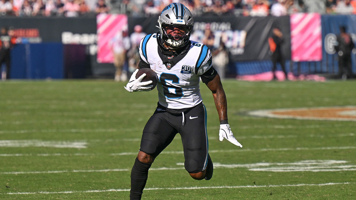 Carolina Panthers running back Miles Sanders (6) runs after a catch against the Chicago Bears during the fourth quarter at Soldier Field.