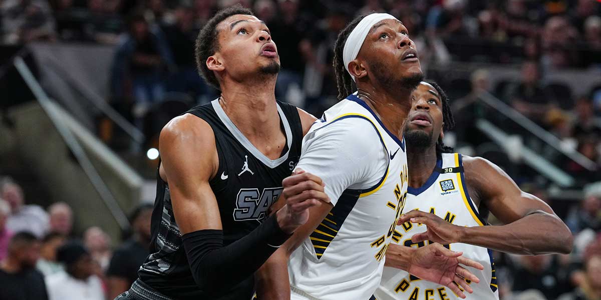 San Antonio Spurs center Victor Wembanyama (1) and Indiana Pacers center Myles Turner (33) battle for position in the second half at Frost Bank Center. 