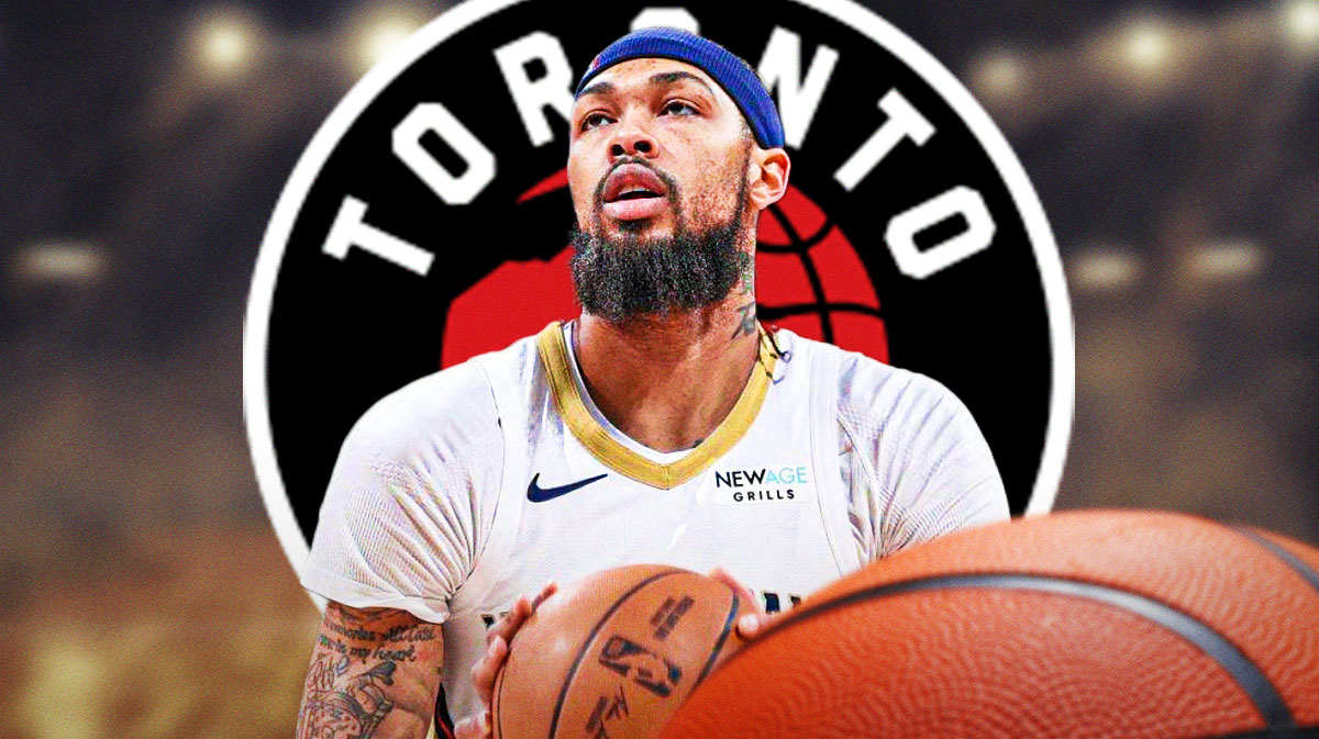 Brandon Ingram looks at Raptors logo