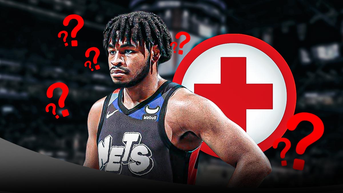 Cam Thomas with medical signs and question marks