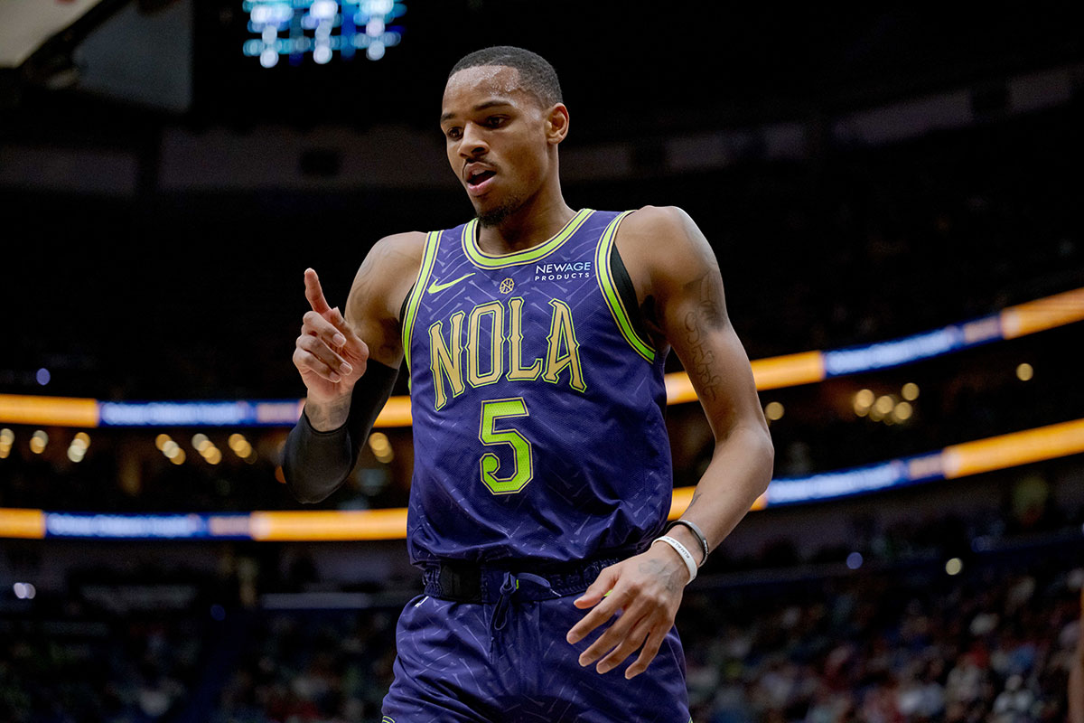 New Orleans Pelicans guard Dejounte Murray (5) shows a one-and-one foul after scoring against the Minnesota Timberwolves during the first half at the Smoothie King Center.