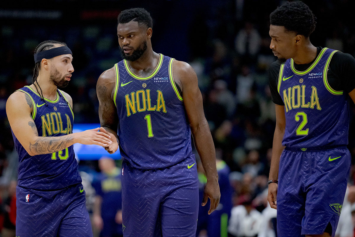 New Orleans Pelicans guard Jose Alvarado (15), forward Zion Williamson (1), and forward Herbert Jones (2) react during the second half against the Minnesota Timberwolves at Smoothie King Center.