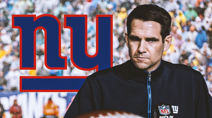 Joe Schoen looking stern, New York Giants logo, football field in background