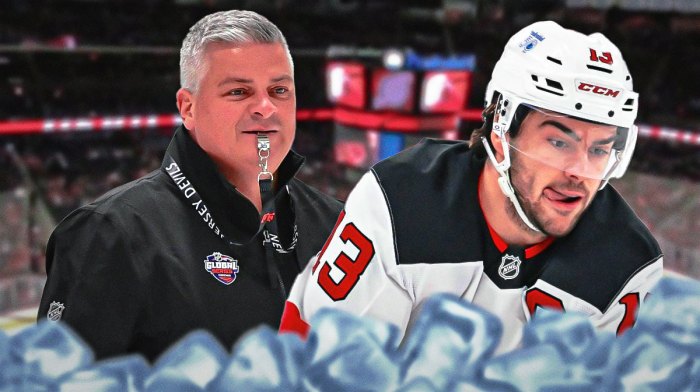 Devils captain Nico Hischier on the right, coach Sheldon Keefe on the left