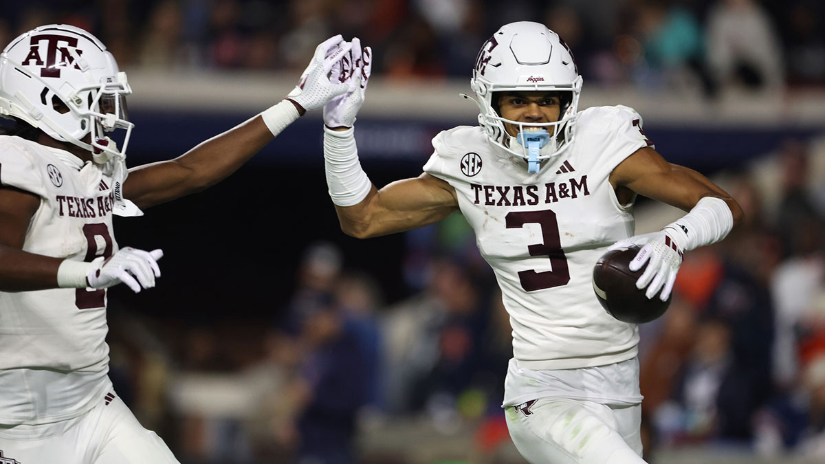 Nov 23, 2024; Auburn, Alabama, USA; Texas A&M Aggies wide receiver Noah Thomas (3) celebrates with Texas A&M Aggies wide receiver Jahdae Walker (9) after scoring a touchdown against the Auburn Tigers in the third quarter at Jordan-Hare Stadium. Mandatory Credit: John Reed-Imagn Images