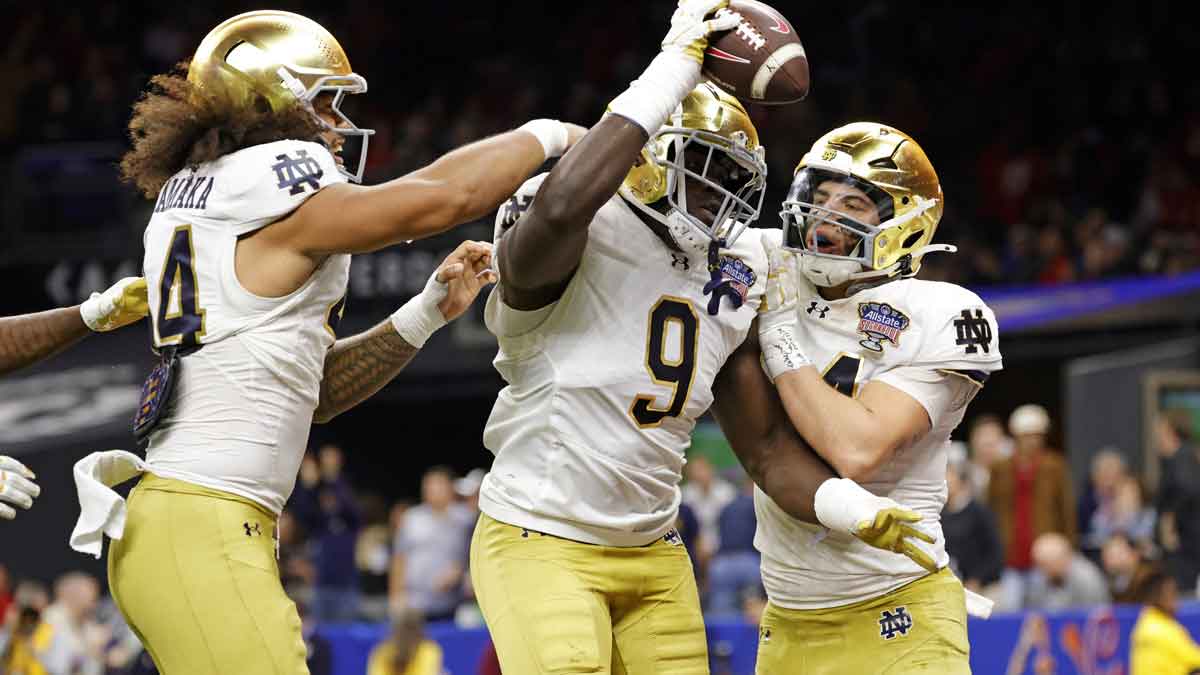 Notre Dame Fighting Irish defensive lineman Junior Tuihalamaka (44) reacts with Notre Dame Fighting Irish defensive lineman RJ Oben (9) after recovering a fumble during the second quarter after the game during the first half at Caesars Superdome. 