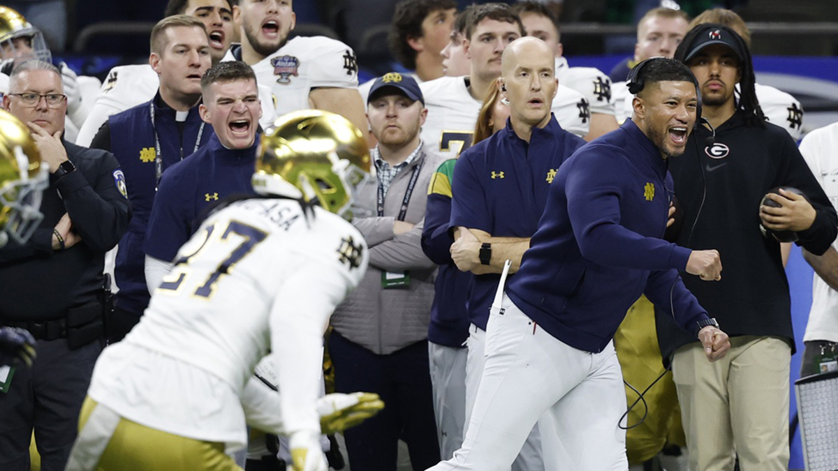 January 2, 2025; New Orleans, LA, USA; Notre Dame Fighting Irish coach Marcus Freeman (R) reacts on the sideline in the final minute against the Georgia Bulldogs during the fourth quarter at Caesars Superdome. Mandatory credit: Geoff Burke-Imagn Images