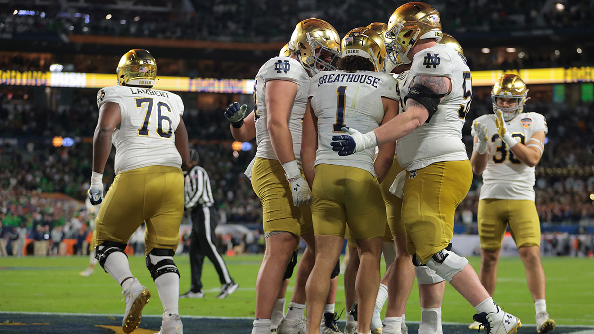 Notre Dame Fighting Irish wide receiver Jaden Greathouse (1) celebrates with teammates after scoring a touchdown in the second half against the Penn State Nittany Lions in the Orange Bowl at Hard Rock Stadium.
