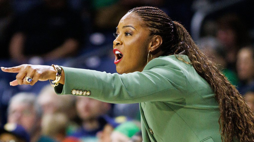 Notre Dame women's basketballl head coach Niele Ivey coaches from the sidelines during a NCAA women's basketball game between Notre Dame and SMU.