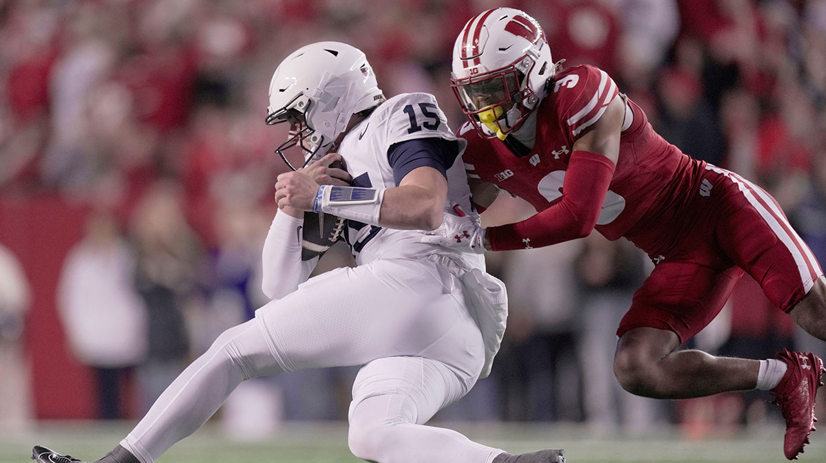 Drev Alrar Penn State (15) stops shorts from the first below Visconsin Cornerback Nizier Fourcurean (3) during the first quarter of their game.