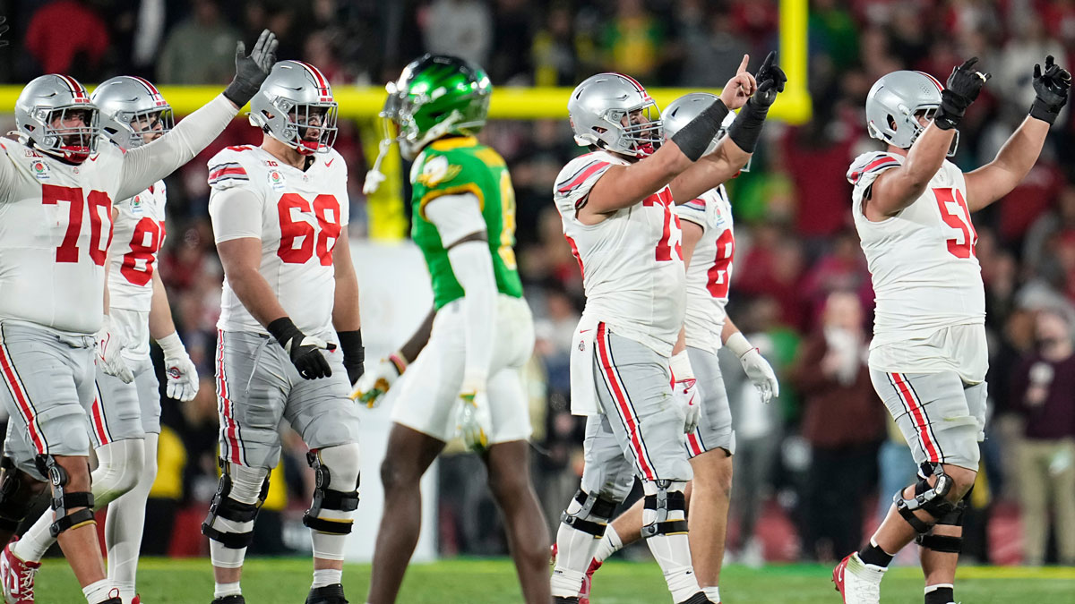 Ohio State Buckeyes offensive linemen cheer during the final seconds of the second half of the College Football Playoff quarterfinal against the Oregon Ducks at the Rose Bowl in Pasadena, Calif. on Jan. 1, 2025. Ohio State won 41-21.