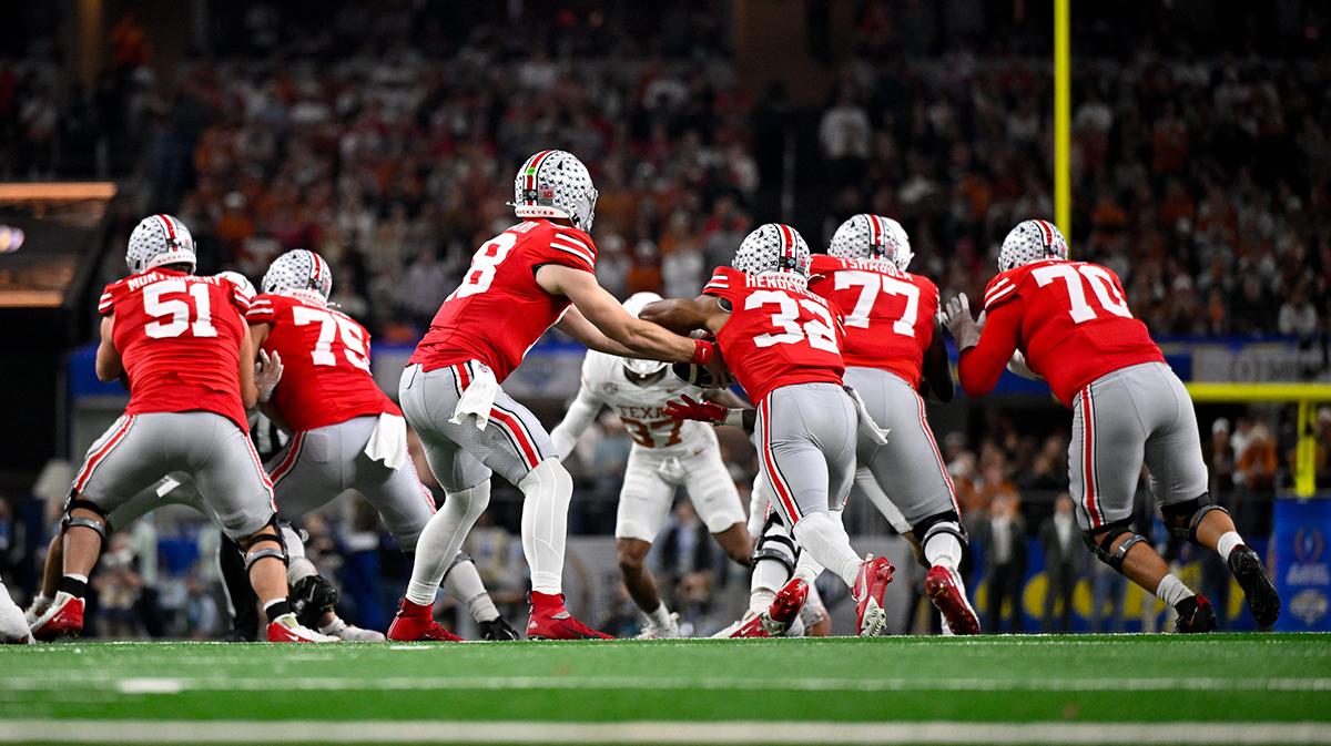 Ohio State Buckeyes quarterback Will Howard (18) and running back TreVayon Henderson (32) in action during the game between the Texas Longhorns and the Ohio State Buckeyes at AT&T Stadium. 