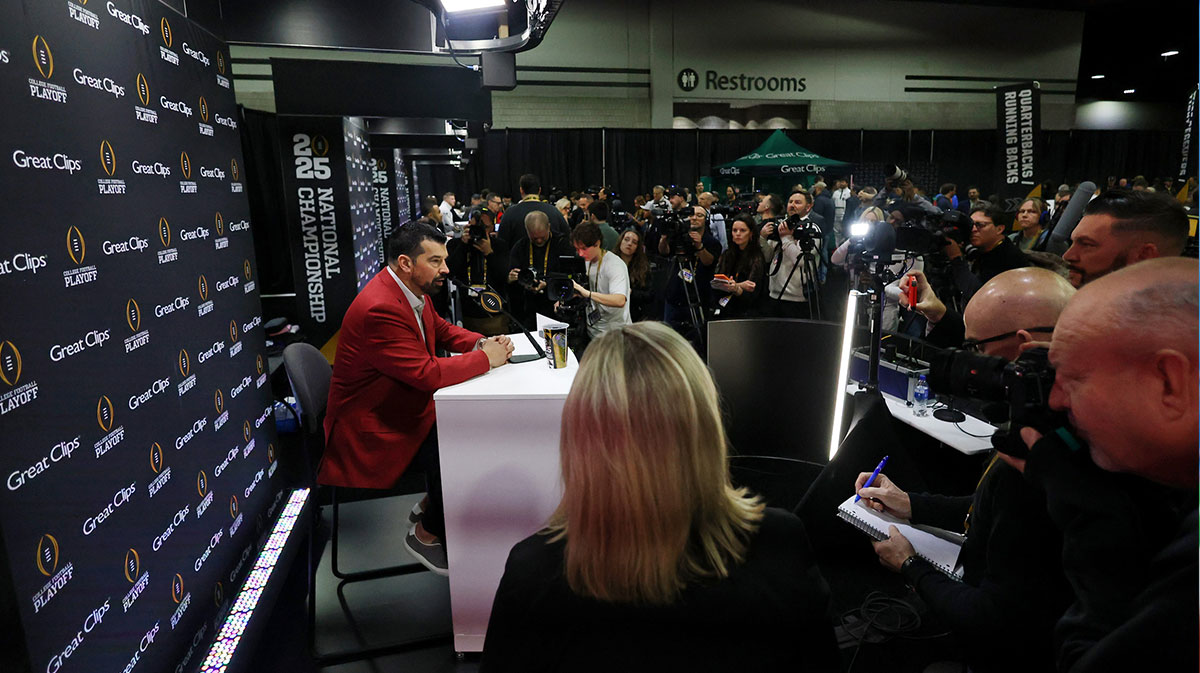 Ohio State Buckeyes head coach Ryan Day talks to the media during 2025 CFP National Championship Media Day at Georgia World Congress Center, Building A.