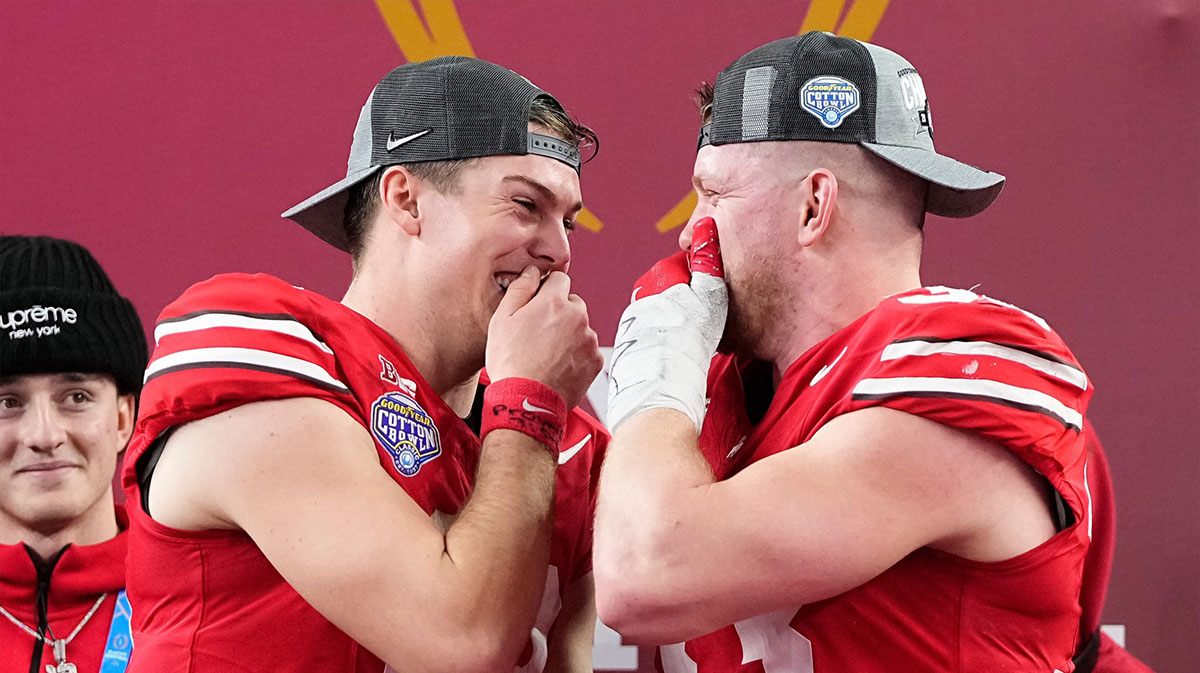Ohio State Buckeyes defensive end Jack Sawyer (33) and quarterback Will Howard (18) celebrate following the 28-14 win over the Texas Longhorns in the Cotton Bowl Classic College Football Playoff semifinal game at AT&T Stadium in Arlington, Texas on Jan. 10, 2025.