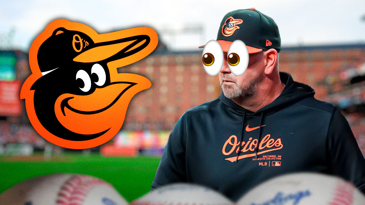 Brandon Hyde with emoji eyes in his eyes looking at an Orioles logo