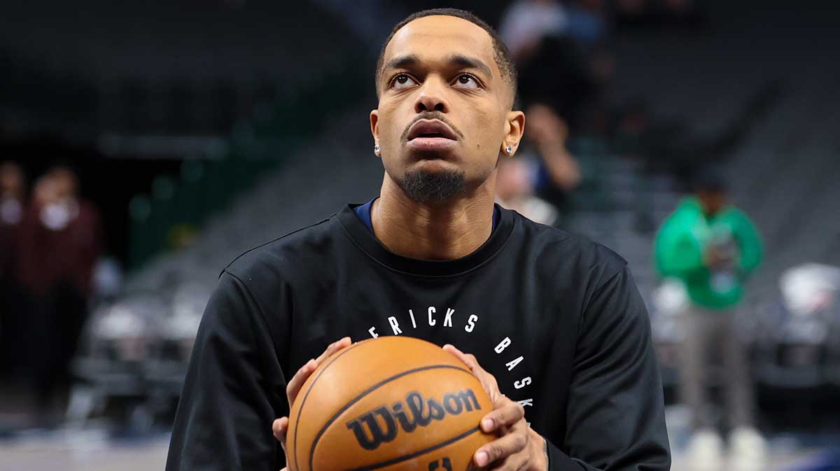 Dallas Mavericks forward P.J. Washington (25) warms up before the game against the Cleveland Cavaliers at American Airlines Center.