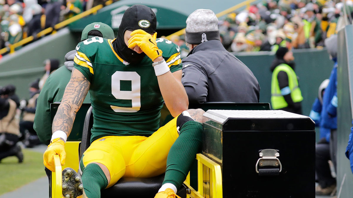 Green Bay Packers wide receiver Christian Watson (9) leaves the field on a cart after getting injured against the Chicago Bears in the second quarter during their football game Sunday, January 5, 2025, at Lambeau Field in Green Bay, Wisconsin.