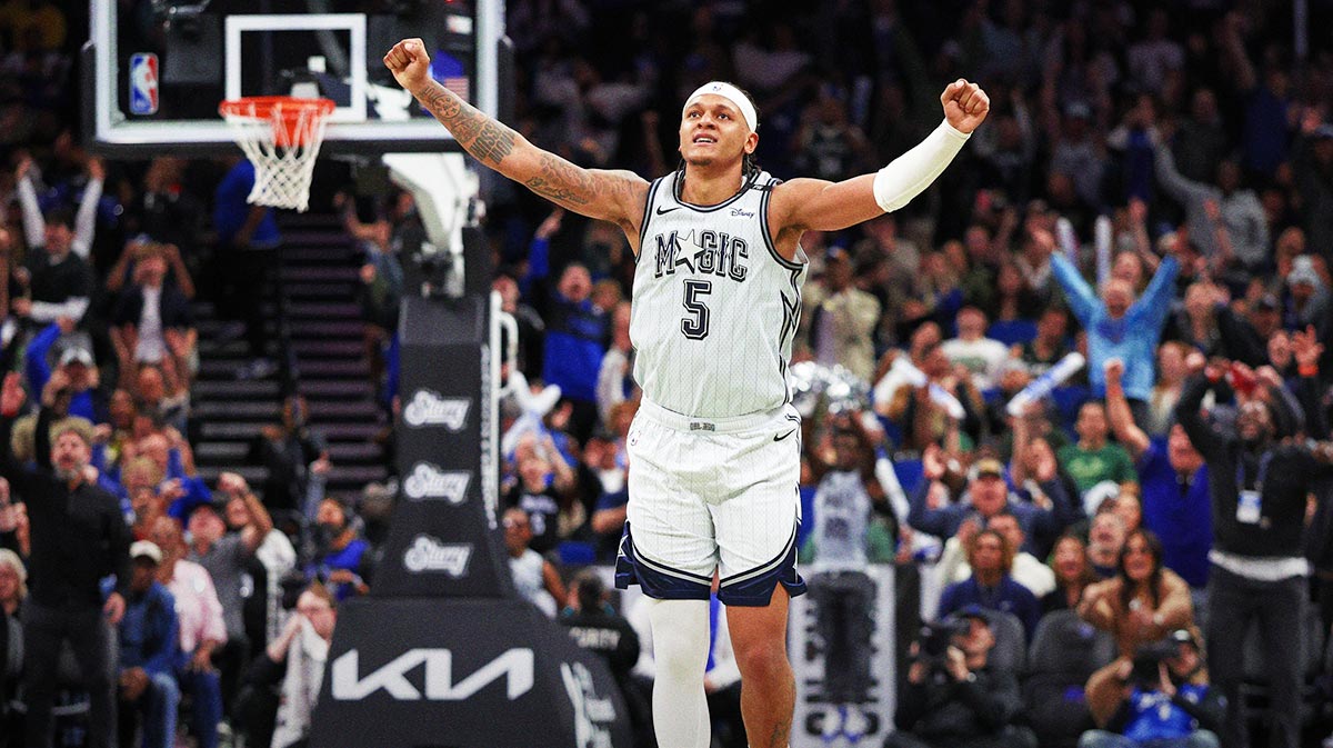Orlando Magic forward Paolo Banchero (5) celebrates after play against the Milwaukee Bucks in the fourth quarter at Kia Center.