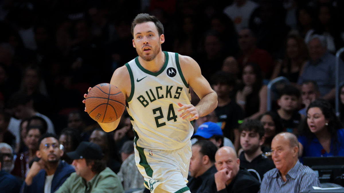 guard Pat Connaughton (24) dribbles the basketball against the Miami Heat during the fourth quarter at Kaseya Center.