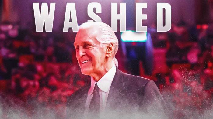 Pat Riley smiling.