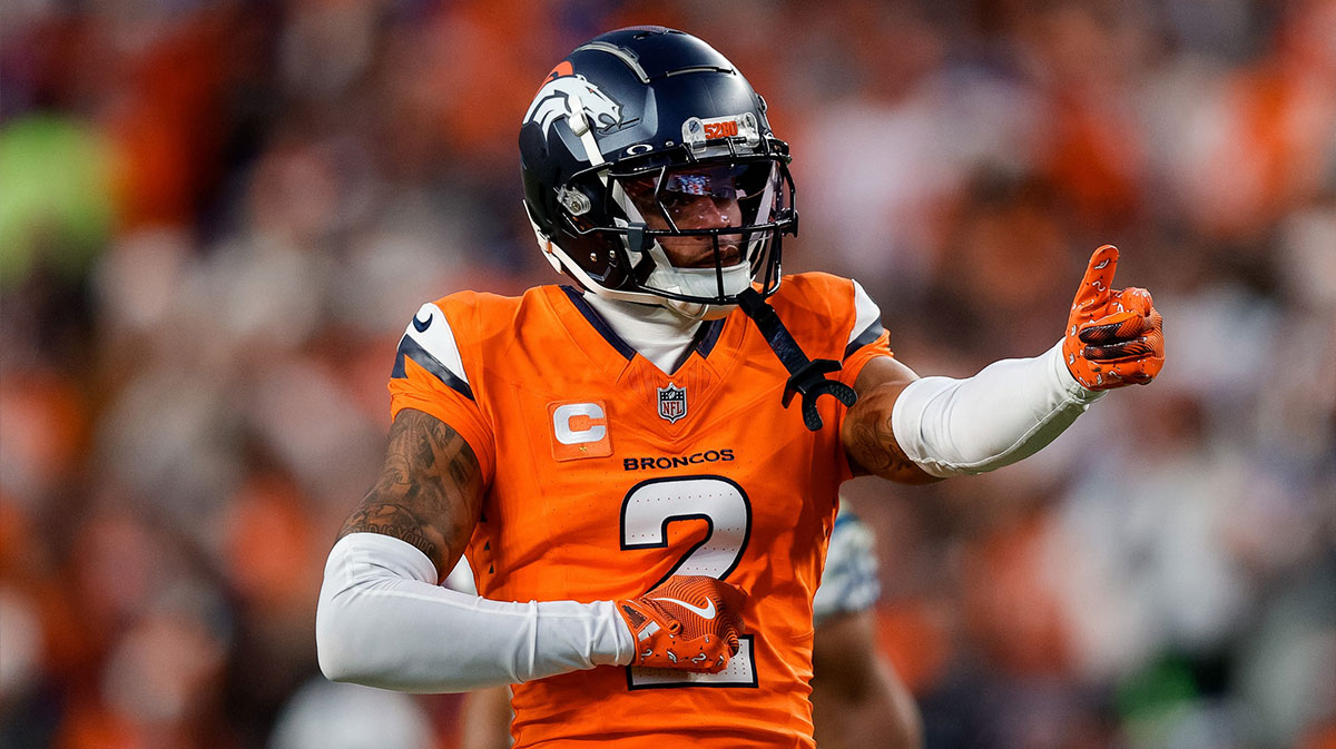 Denver Broncos cornerback Pat Surtain II (2) gestures after a play in the third quarter against the Indianapolis Colts at Empower Field at Mile High.