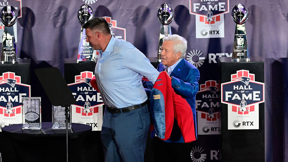 New England Patriots former linebacker and current Tennessee Titans head coach Mike Vrabel receives his red jacket from Patriots owner Robert Kraft at the 2023 New England Patriots Hall of Fame induction at the Cross Insurance Pavilion at Gillette Stadium.