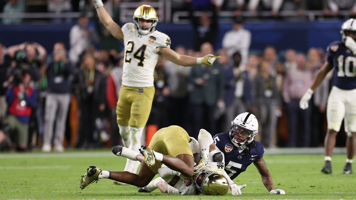 Notre Dame Fighting Irish cornerback Christian Gray (29) intercepts the ball in front of Penn State Nittany Lions wide receiver Omari Evans (5) in the second half in the Orange Bowl at Hard Rock Stadium. 