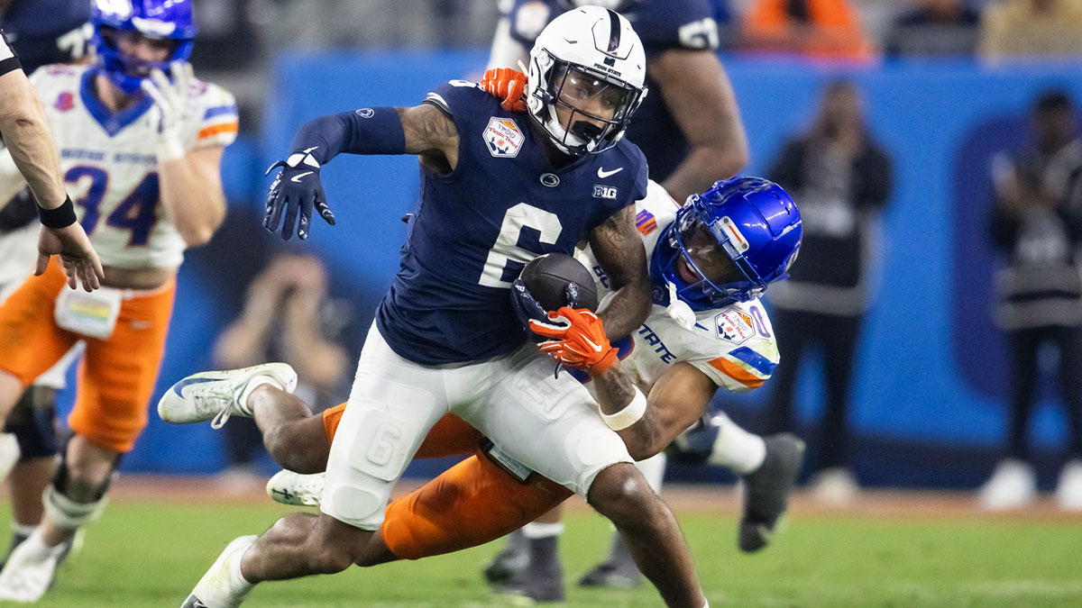 Penn State Nittany Lions wide receiver Harrison Wallace III (6) is tackled by Boise State Broncos safety Ty Benefield (0) during the Fiesta Bowl at State Farm Stadium. Mandatory Credit: Mark J. Rebilas-