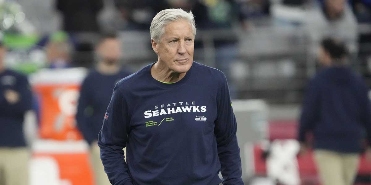 Seattle Seahawks head coach Pete Carroll watches as his team warms up before a game against the Arizona Cardinals in Glendale on January 7, 2024.