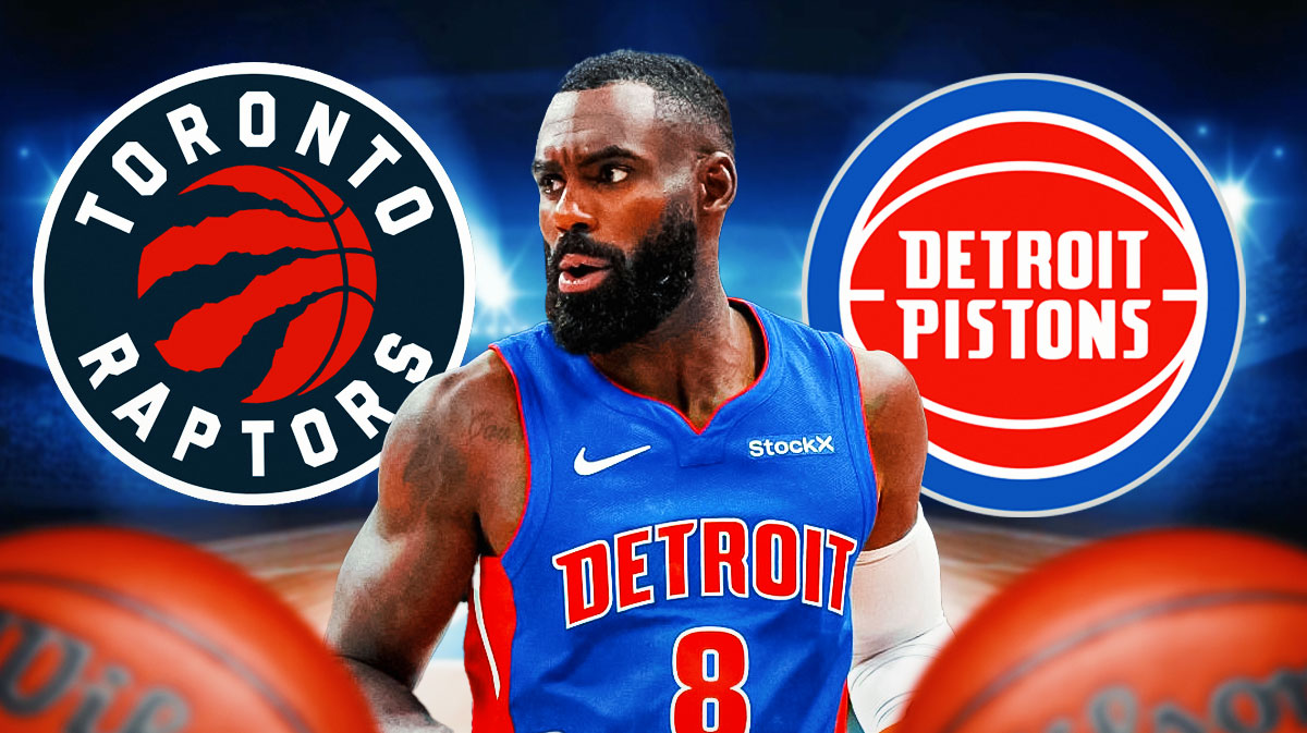 Pistons Tim Hardaway Jr (front) with Detroit Pistons and Toronto Raptors logo in background