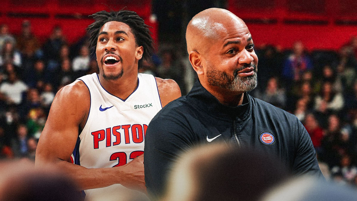JB Bickerstaff next to Jaden Ivey in front on the Pistons court.