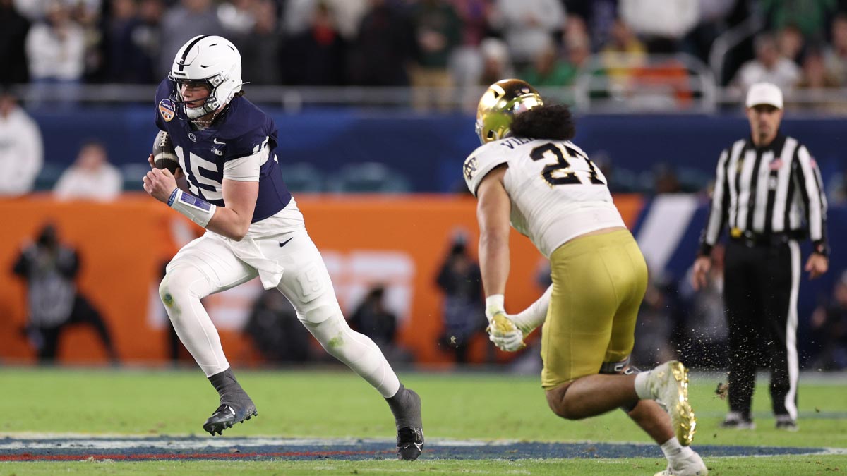 Penn State Nittany Lions quarterback Drew Allar (15) runs the ball in the second half against the Notre Dame Fighting Irish in the Orange Bowl at Hard Rock Stadium.