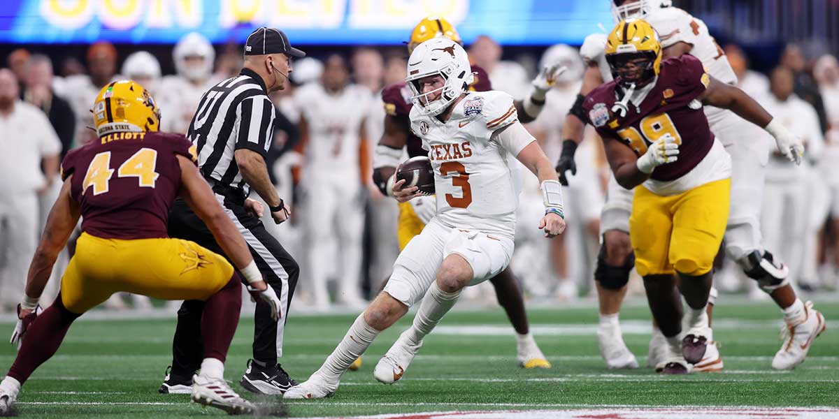 Jan 1, 2025; Atlanta, GA, USA; Texas Longhorns quarterback Quinn Ewers (3) runs with the ball against the Arizona State Sun Devils during the second half of the Peach Bowl at Mercedes-Benz Stadium. Mandatory Credit: Brett Davis-Imagn Images