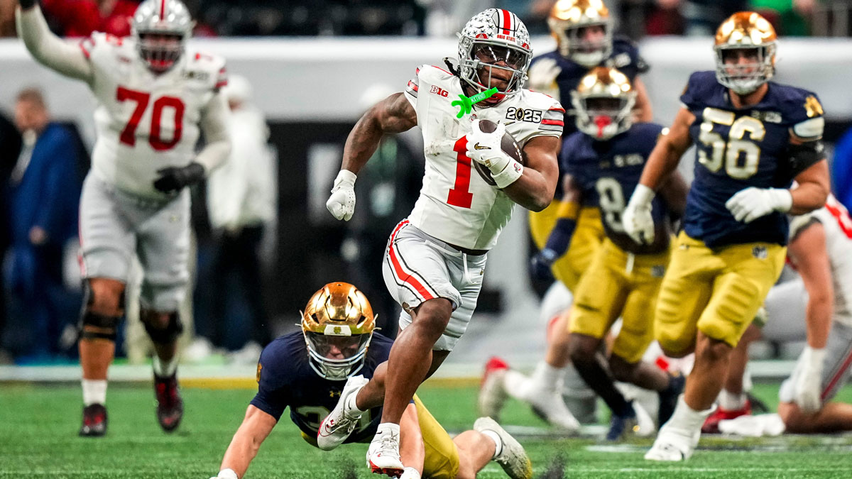 Ohio State Buckeyes running back Quinshon Judkins (1) runs the ball against the Notre Dame Fighting Irish during the College Football Playoff championship at Mercedes-Benz Stadium
