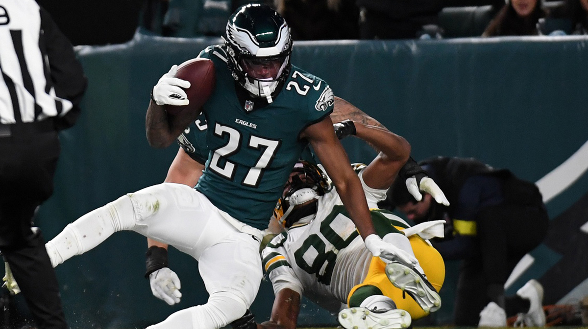 Philadelphia Eagles cornerback Quinyon Mitchell (27) intercepts a pass against Green Bay Packers wide receiver Bo Melton (80) during the second half of the NFC wild card game at Lincoln Financial Field. Mandatory credit: Eric Hartline-Imagn Images