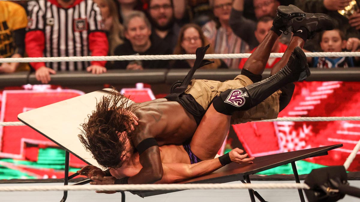 R-Truth and JD McDonagh going through a table on WWE Monday Night RAW on December 18, 2023.