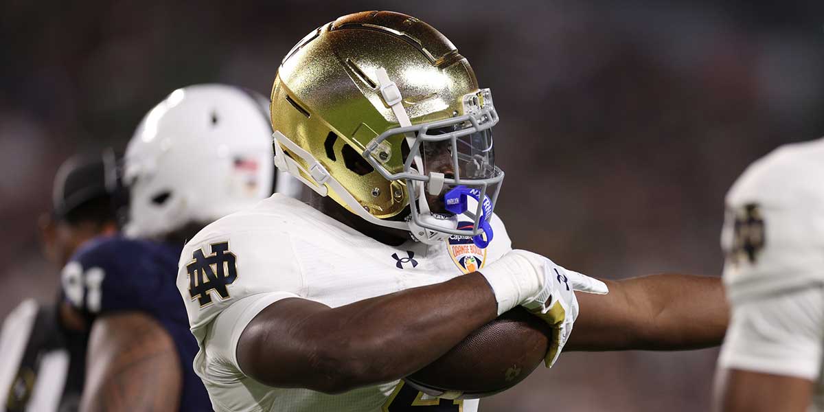 Notre Dame Fighting Irish running back Jeremiyah Love (4) celebrates a first down in the first half against the Penn State Nittany Lions at Hard Rock Stadium.