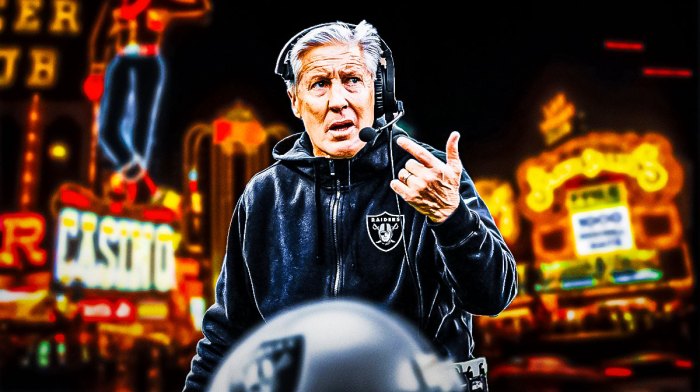 Pete Carroll wearing Raiders gear