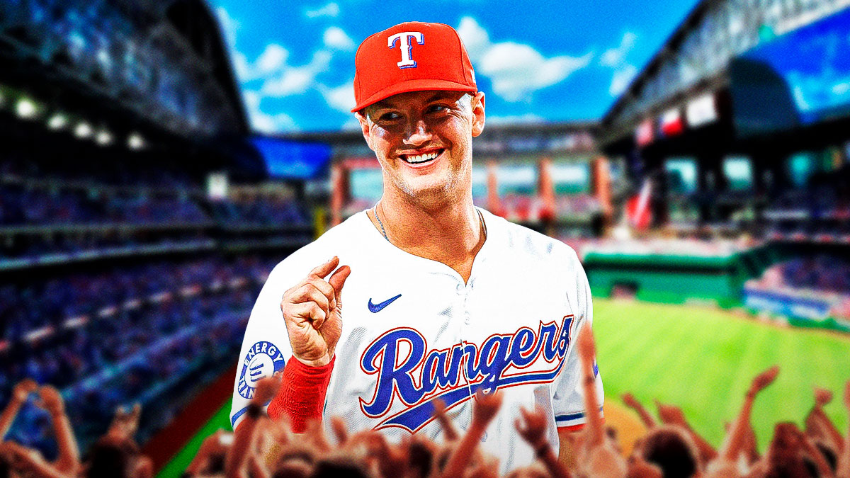 Josh Jung smiles in Texas Rangers uniform