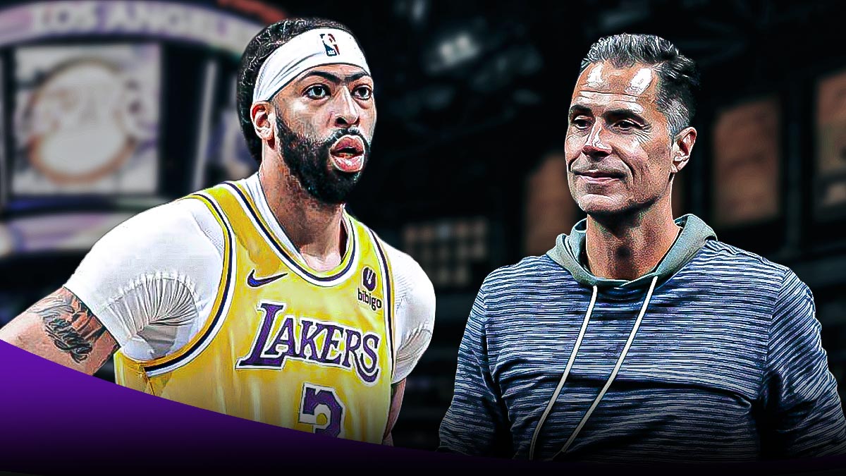 Rob Pelinka next to Anthony Davis in the Lakers arena.