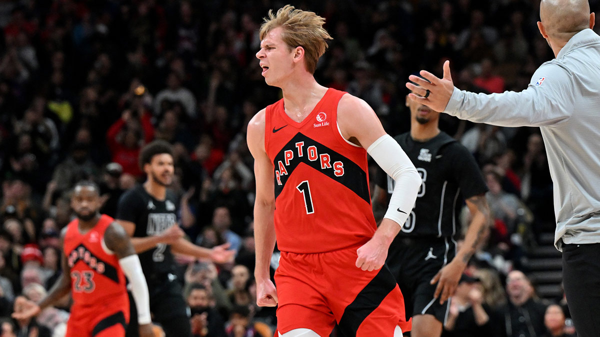 Raptors guard Gradey Dick (1) reacts after making a three-point basket against the Brooklyn Nets in the first half at Scotiabank Arena