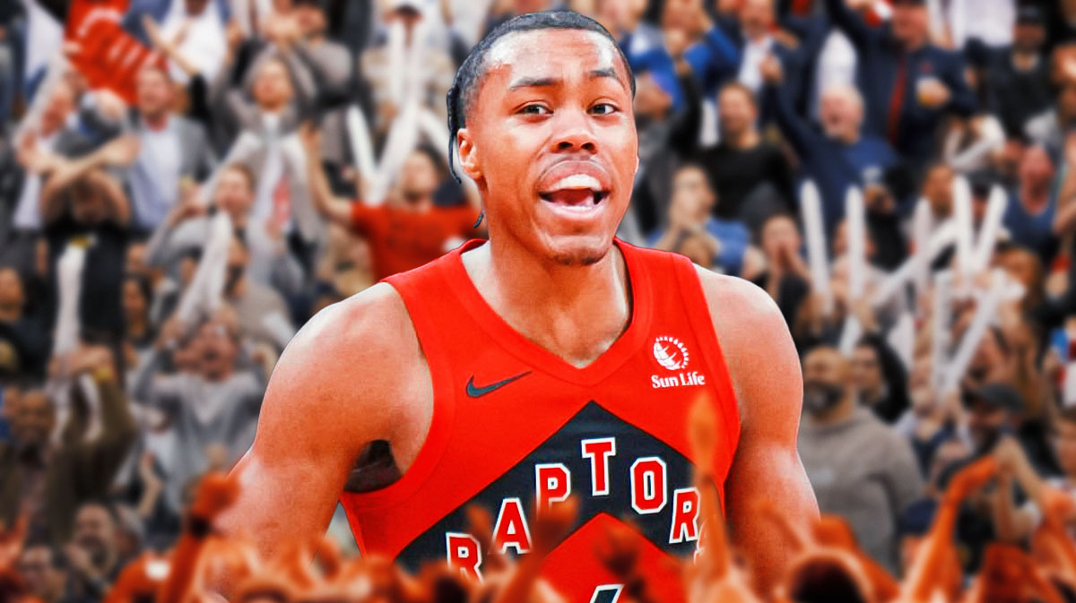 Scottie Barnes in Raptors gear with fans background.