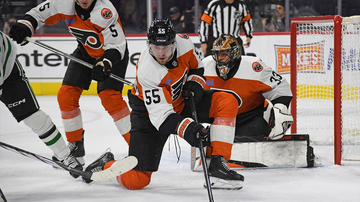 Philadelphia Flyers defenseman Rasmus Ristolainen (55) clears the puck against the Dallas Stars in the second period at the Wells Fargo Center.