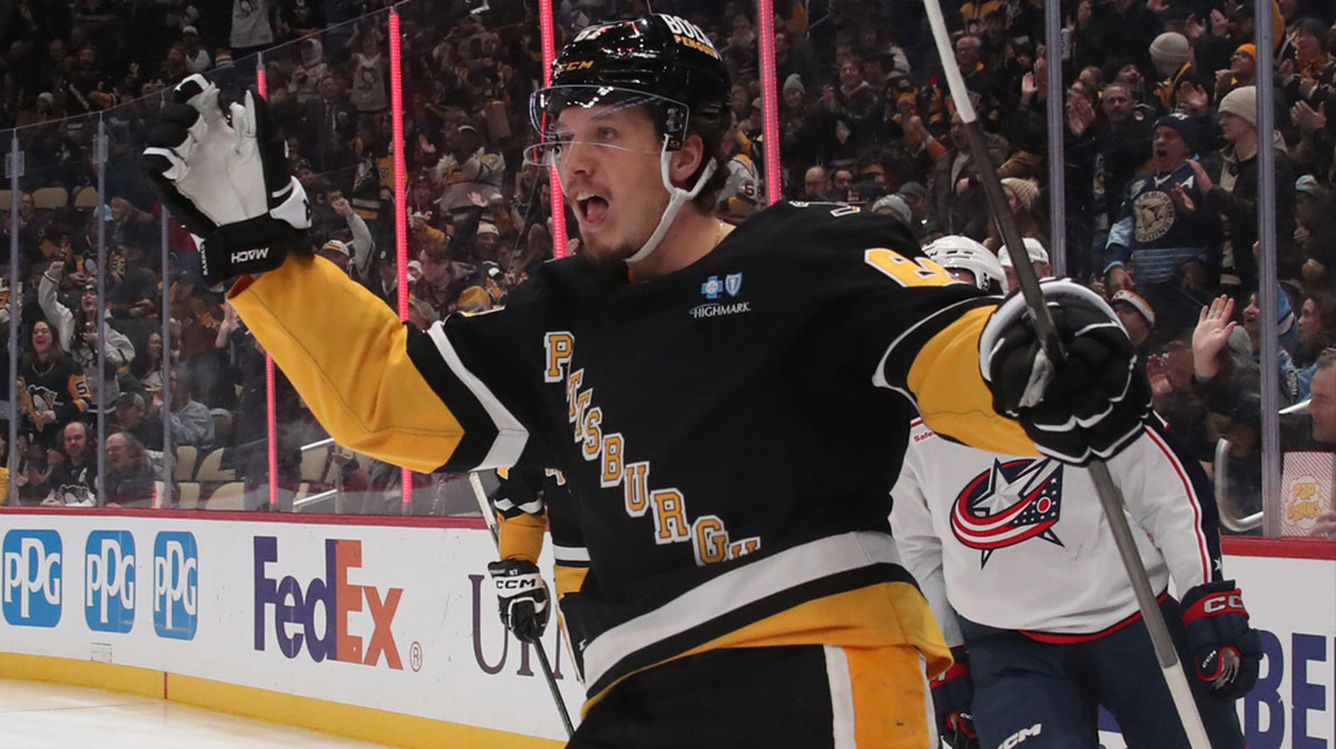 Pittsburgh Penguins right wing Rickard Rakell (67) reacts after scoring a goal against the Columbus Blue Jackets during the third period at PPG Paints Arena.