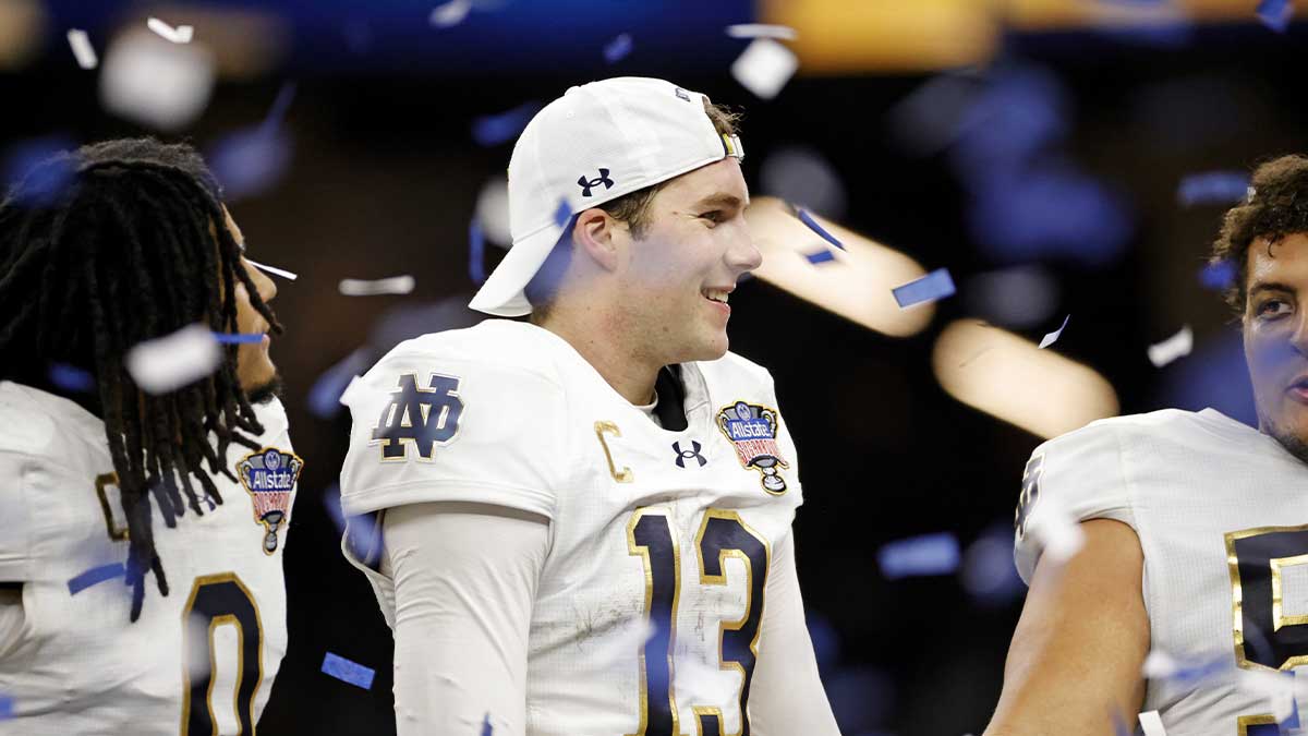 Notre Dame Fighting Irish quarterback Riley Leonard (13) celebrates the win against Georgia Bulldogs at Caesars Superdome.