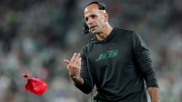 Sep 19, 2024; East Rutherford, New Jersey, USA; New York Jets head coach Robert Saleh throws a challenge flag during the second quarter against the New England Patriots at MetLife Stadium.