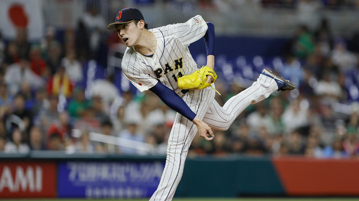 Japan starting pitcher Roki Sasaki (14) delivers the ball during the first inning against Mexico at LoanDepot Park. 