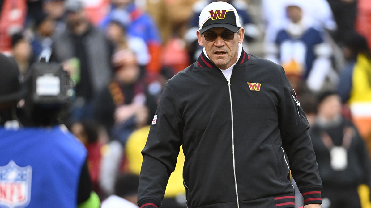 Washington Commanders head coach Ron Rivera on the field before the game against the Dallas Cowboys at FedExField.