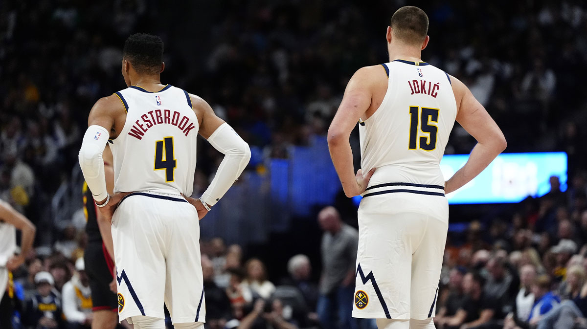 Denver Nuggets guard Russell Westbrook (4) and center Nikola Jokic (15) during the third quarter against the Atlanta Hawks at Ball Arena.
